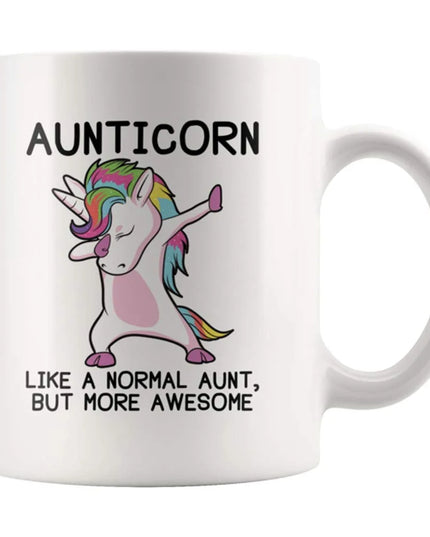 Weiße Keramik Einhorn Tasse mit dem Aufdruck 'Aunticorn - Like a normal Aunt but more awesome', perfekt als Geschenk für Tanten.