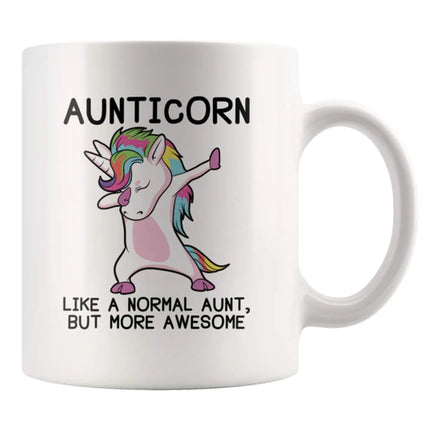 Weiße Keramik Einhorn Tasse mit dem Aufdruck 'Aunticorn - Like a normal Aunt but more awesome', perfekt als Geschenk für Tanten.