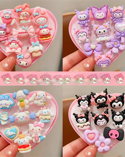 9-teiliges Einhorn Ring Set aus Acryl mit süßen Cartoon-Tiermotiven in einer Geschenkbox