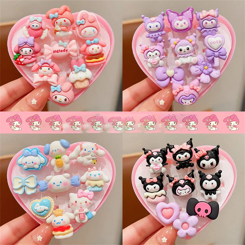 9-teiliges Einhorn Ring Set aus Acryl mit süßen Cartoon-Tiermotiven in einer Geschenkbox