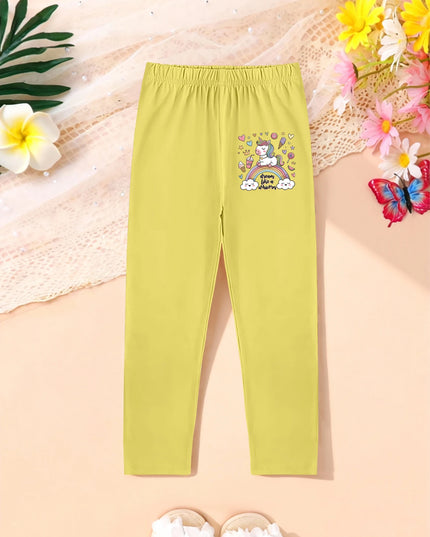 Mädchen in süßer Einhorn Leggings mit Regenbogen- und Cartoon-Einhorn-Print für den Herbst