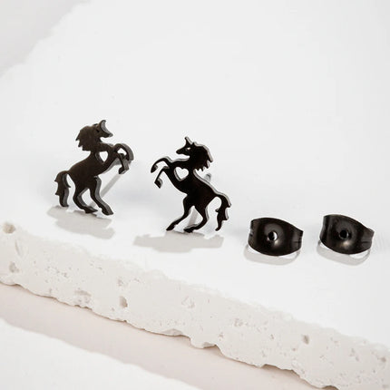 Coole Einhorn Ohrringe in Form eines Dinosauriers in Schwarz, aus langlebigem Edelstahl.