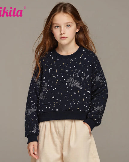 Mädchen in einem gemütlichen VIKITA Einhorn Hoodie mit Sternen- und Mond-Print, ideal für Teenager und Kinder.