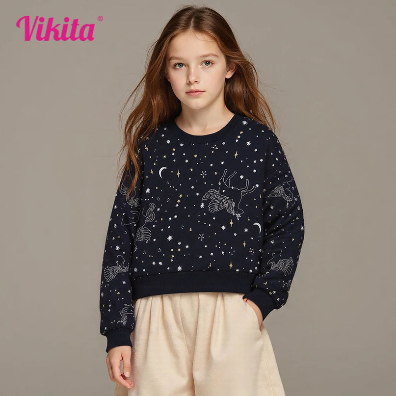 Mädchen in einem gemütlichen VIKITA Einhorn Hoodie mit Sternen- und Mond-Print, ideal für Teenager und Kinder.