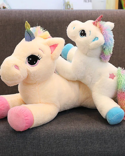 Großes Regenbogen Einhorn Kissen aus weichem Plüsch in Blau oder Pink, erhältlich in 40cm, 60cm und 80cm