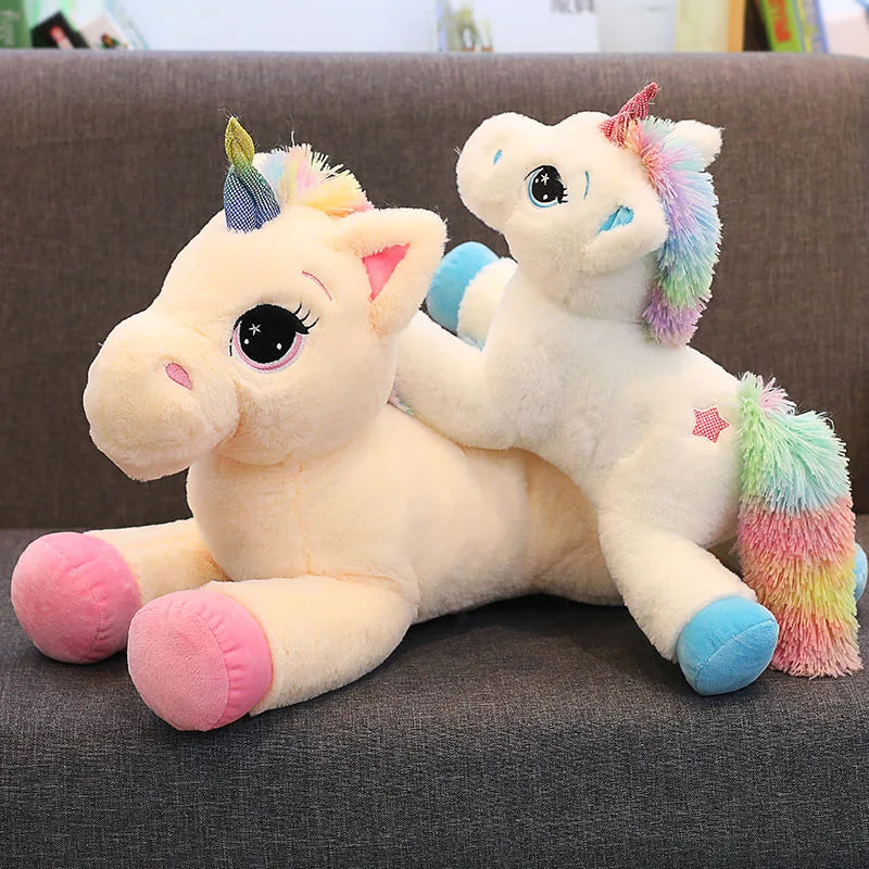 Großes Regenbogen Einhorn Kissen aus weichem Plüsch in Blau oder Pink, erhältlich in 40cm, 60cm und 80cm