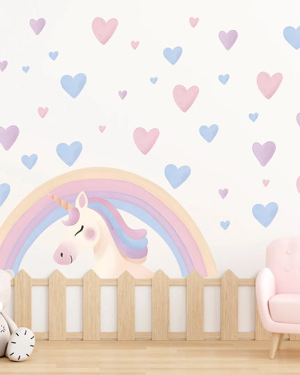Zwei Einhorn Wandtattoos mit Cartoon-Einhörnern, die von Herzen und Regenbogen umgeben sind, perfekt für Mädchenzimmer.