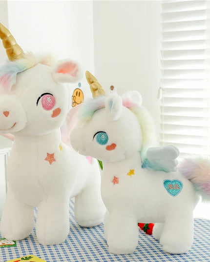 Niedliches Einhorn Kissen mit rosa Flügeln und weichem Plüschmaterial in 25cm, 40cm und 55cm Größe