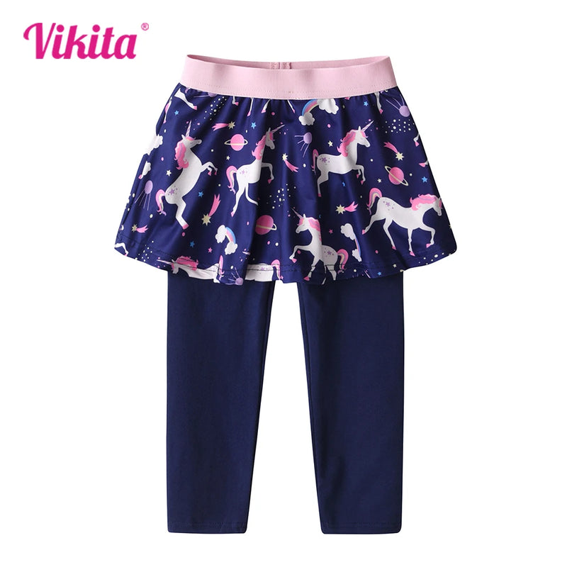 Mädchen in galaktischer Einhorn Leggings mit angenähtem Rock und Einhorn-Cosmos-Print