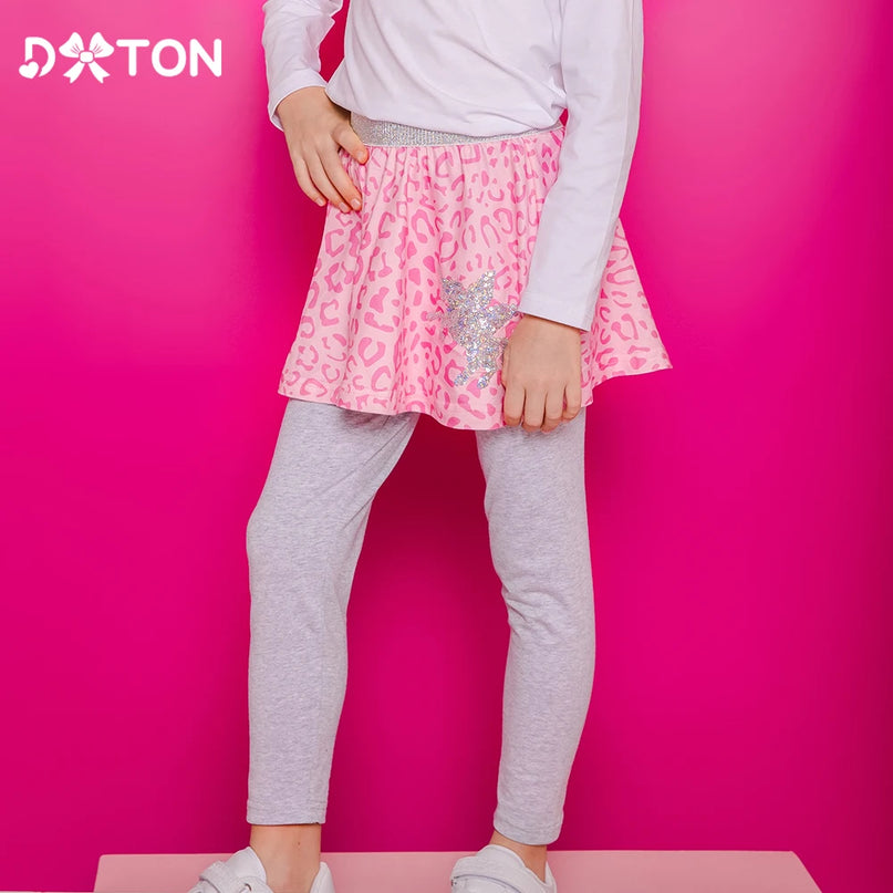 Mädchen Einhorn Leggings mit einem angenähten Rock, verziert mit glitzernden Pailletten-Einhörnern