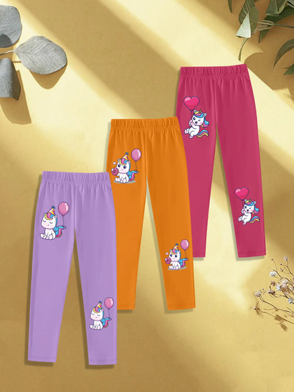 Drei verschiedene Einhorn Leggings im Set, jeweils mit Cartoon-Einhörnern und bunten Ballons bedruckt