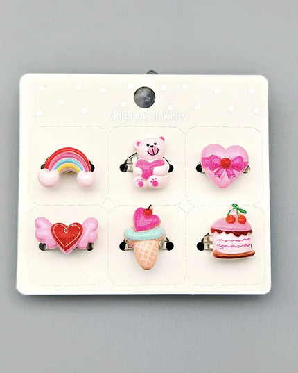 Set aus 12 bunten, verstellbaren Einhorn Ringen aus Resin in einer Blumen-Geschenkbox für Kinder