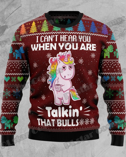 Einhorn Pullover mit lustigem Weihnachts-Einhorn-Motiv, umgeben von festlichen Elementen und Schneeflocken auf dunklem Hintergrund