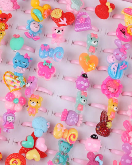 Set aus 10 bunten Einhorn Ringen für Kinder mit gemischten Harz-Cabochons und süßen Motiven