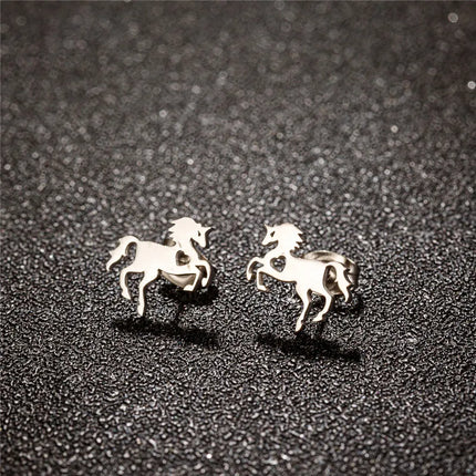 Elegante Einhorn Ohrringe in Form eines Dinosauriers in glänzendem Silber, aus robustem Edelstahl gefertigt.